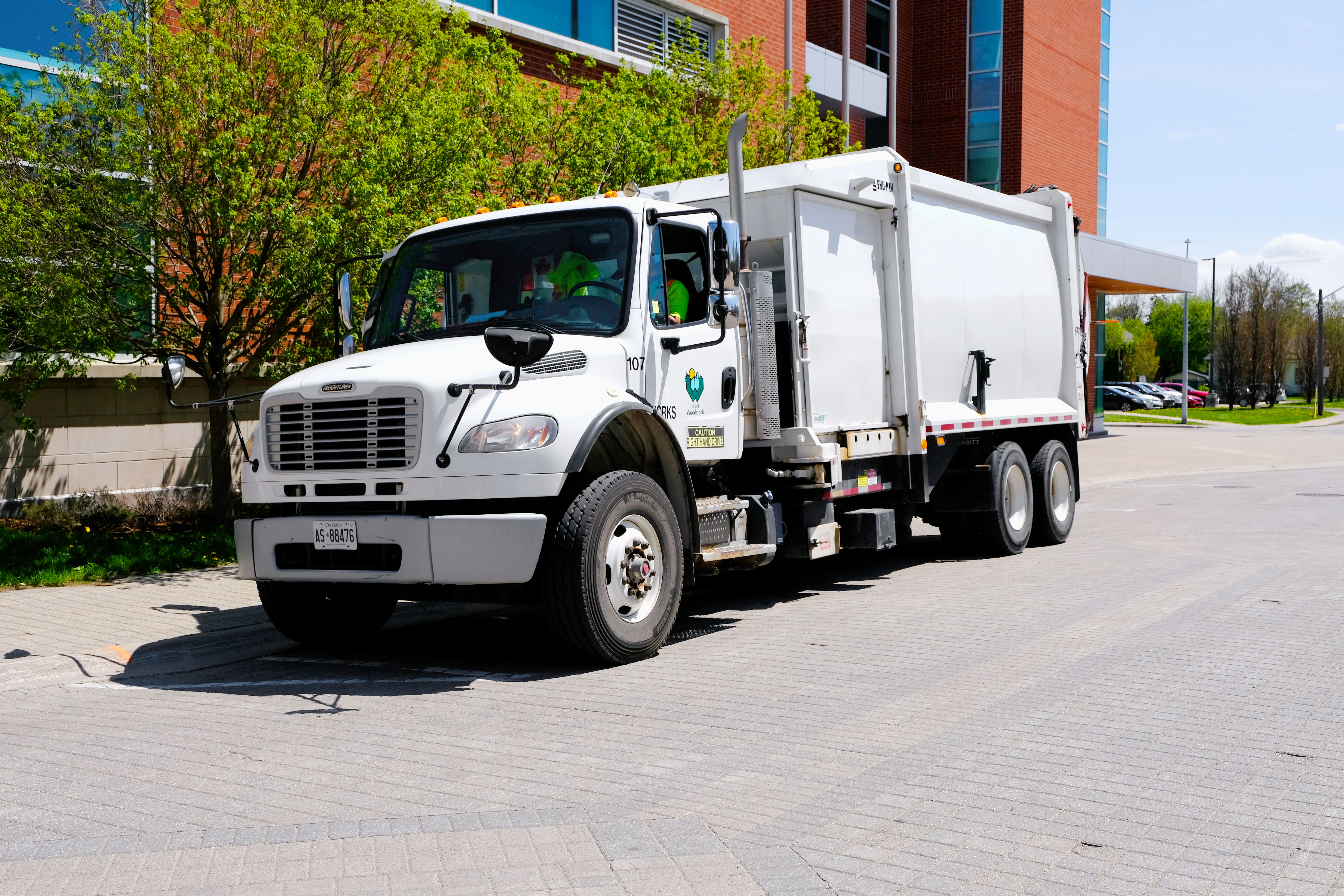 A photograph of a recycling truck in the City of Woodstock, Ontario.