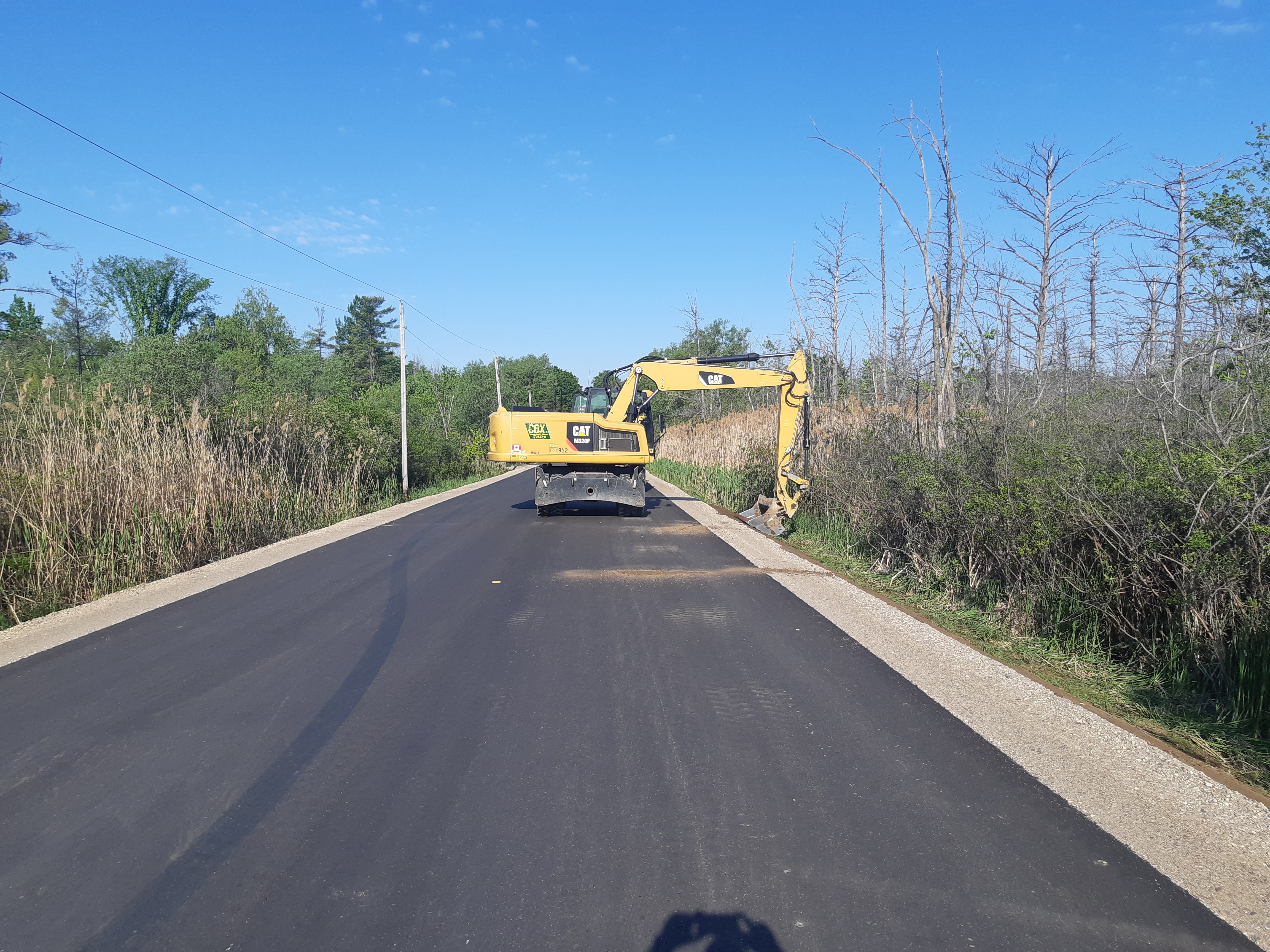 A photograph showing roadwork being carried out in Puslinch, Ontario.